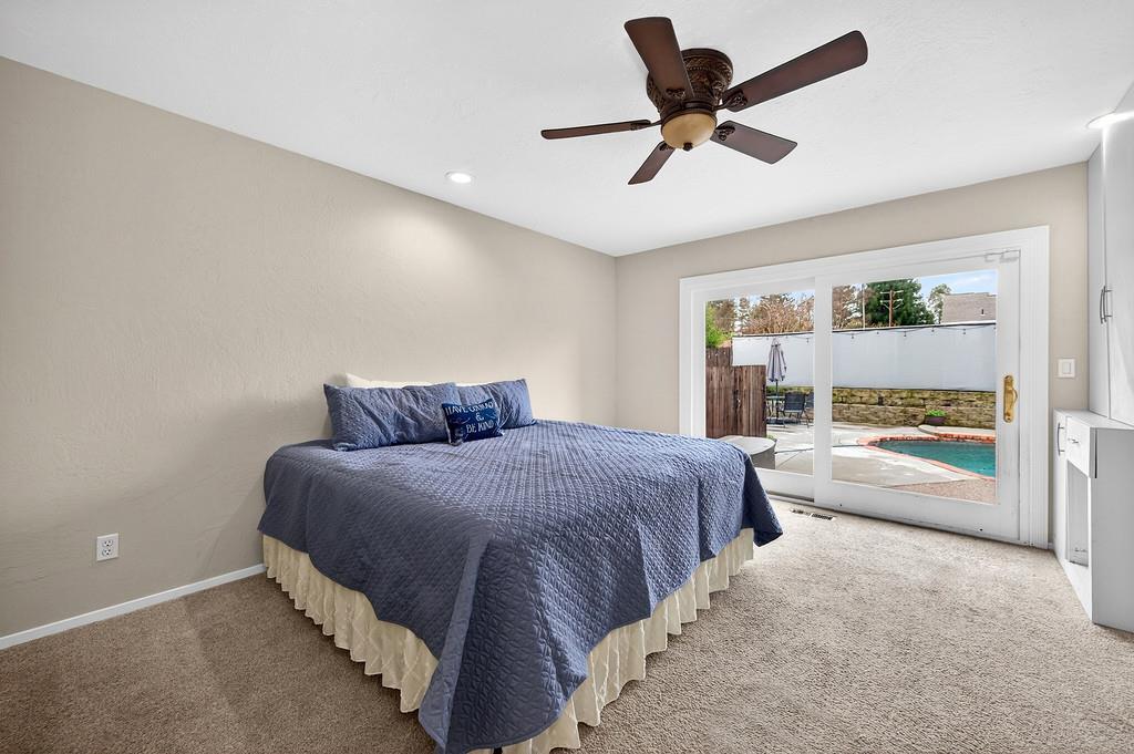 4337 Bannister Road Fair Oaks, CA 95628 - Photo 20 of 35 a bed room with a bed and a large window