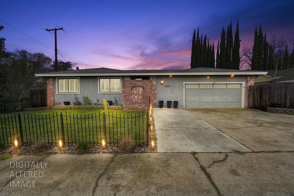 4337 Bannister Road Fair Oaks, CA 95628 - Photo 2 of 35 a front view of a house with a garden and plants