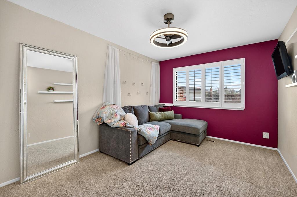 4337 Bannister Road Fair Oaks, CA 95628 - Photo 22 of 35 a living room with furniture and a window