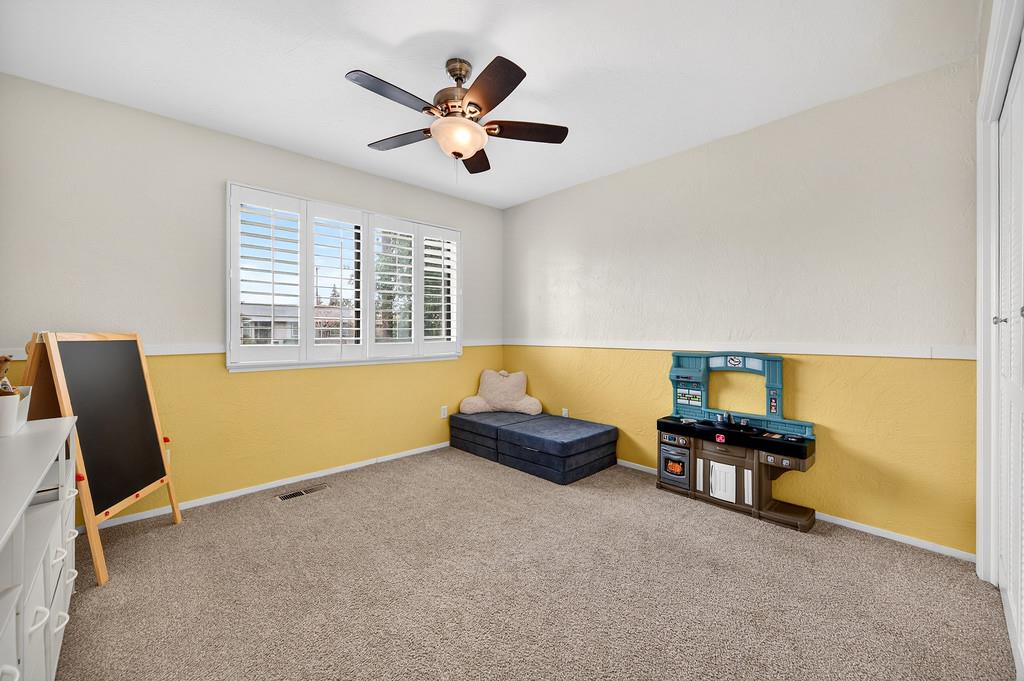 4337 Bannister Road Fair Oaks, CA 95628 - Photo 23 of 35 a bedroom with furniture and a window