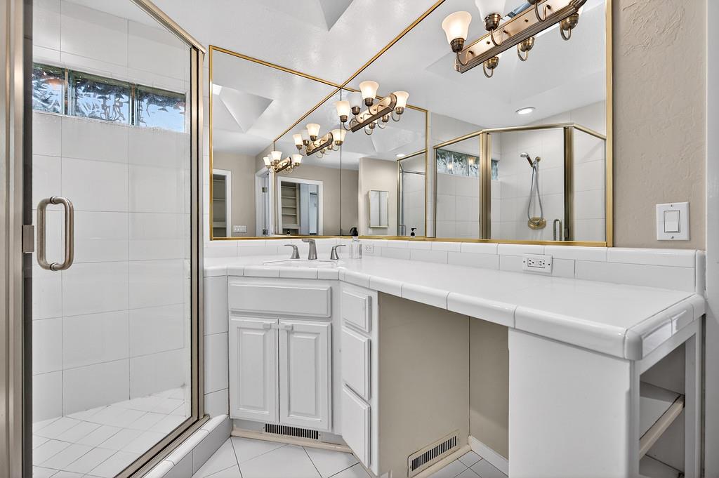 4337 Bannister Road Fair Oaks, CA 95628 - Photo 25 of 35 a bathroom with a sink and a mirror