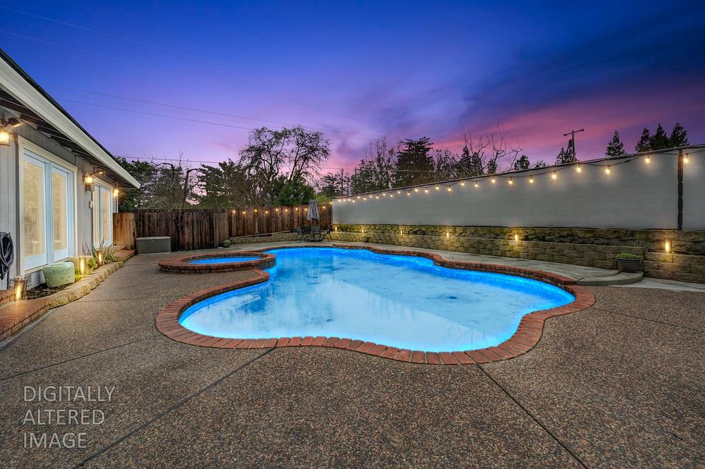 4337 Bannister Road Fair Oaks, CA 95628 - Photo 27 of 35 a view of a swimming pool and an outdoor seating