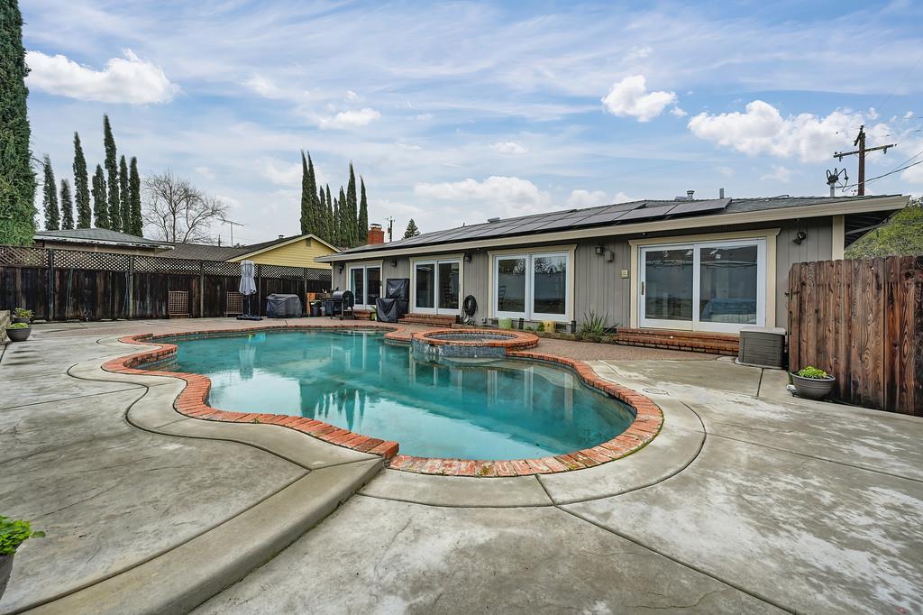 4337 Bannister Road Fair Oaks, CA 95628 - Photo 33 of 35 a view of a house with swimming pool