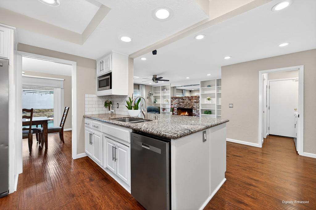 4337 Bannister Road Fair Oaks, CA 95628 - Photo 6 of 35 a kitchen with stainless steel appliances granite countertop a sink and stove