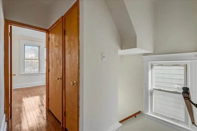a view of a closet area with empty room