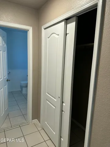 a view of a bathroom from a hallway