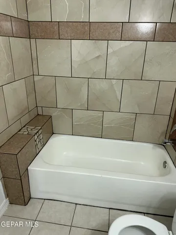 a bathroom with a bathtub