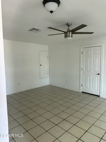 a view of a room has an empty space