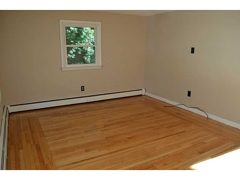 40 Iroquois Road Cumberland, RI 02864 - Photo 7 of 11 Living Room.