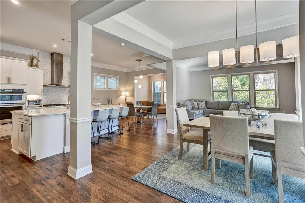 1185 Hampton Park Road Decatur, GA 30033 - Photo 1 of 1 a view of a dining room with furniture window and wooden floor
