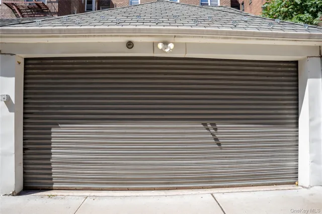 a close view of a sink a mirror and a shower
