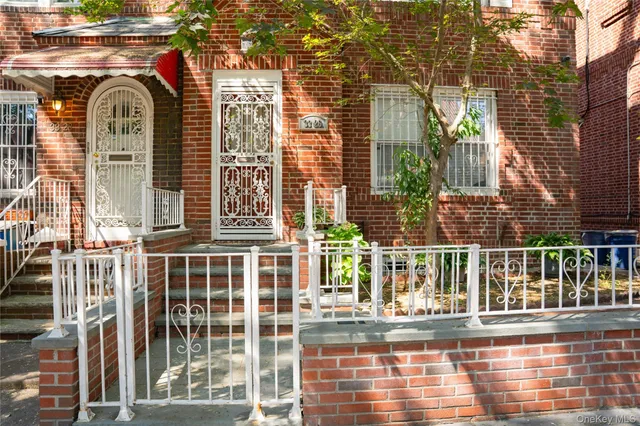 a view of a brick building with a door
