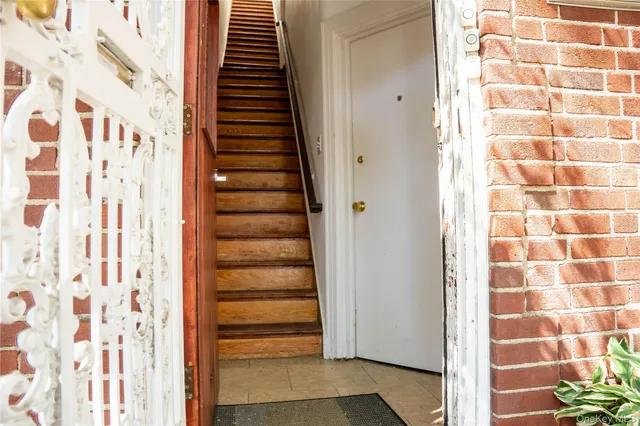 a view of a bathroom with white door