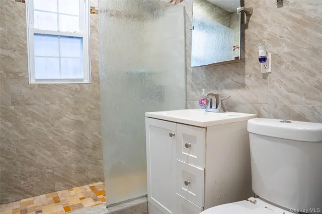 a utility room with a sink a washer and dryer