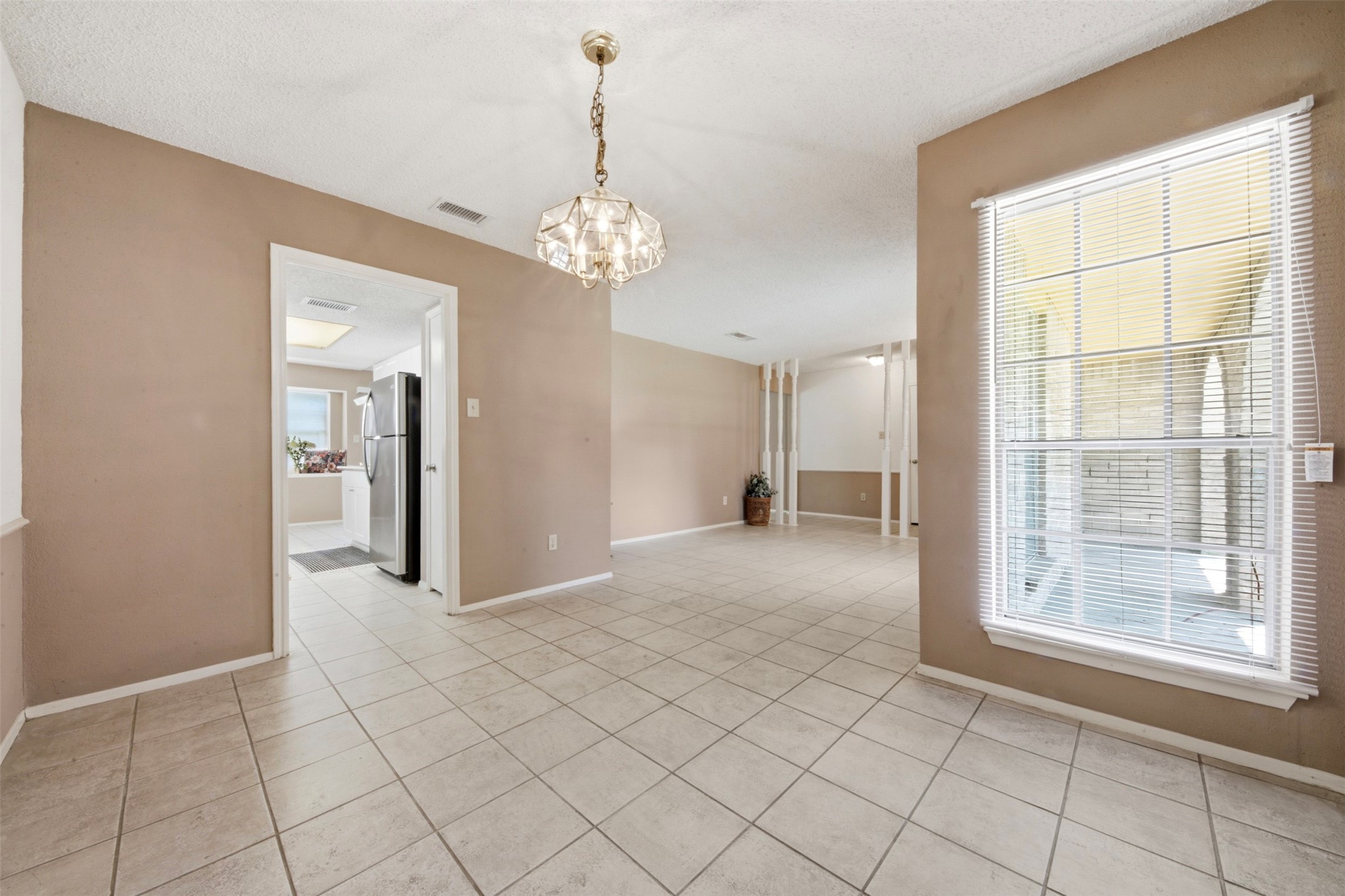 4019 Postwood Drive Spring, TX 77388 - Photo 9 of 50 a view of an empty room with a window