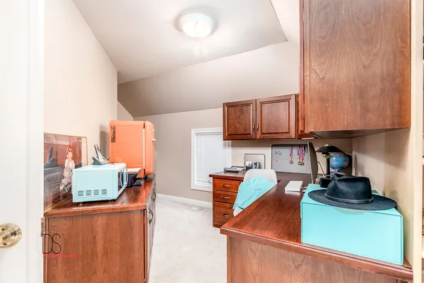 a bedroom with furniture and a bed