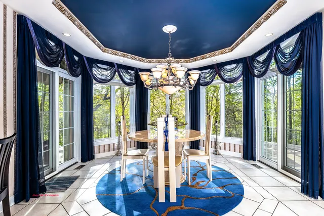 a kitchen with stainless steel appliances granite countertop a stove and cabinets