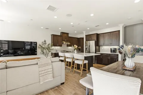 a living room with furniture and flat screen tv