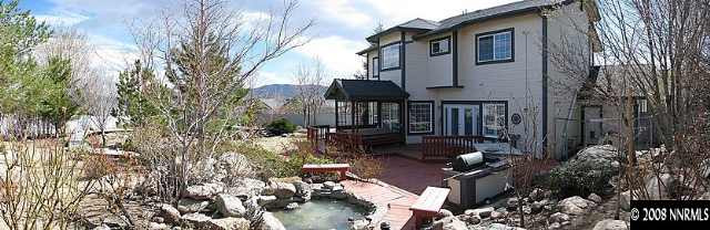 35 Telluride Court Reno, NV 89511 - Photo 8 of 8 a front view of a house with garden