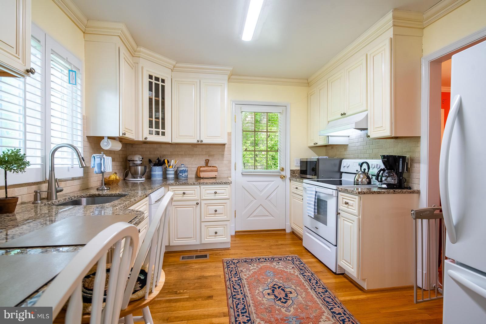 9112 Grist Mill Road Alexandria, VA 22309 - Photo 16 of 35 View from Kitchen to rear yard
