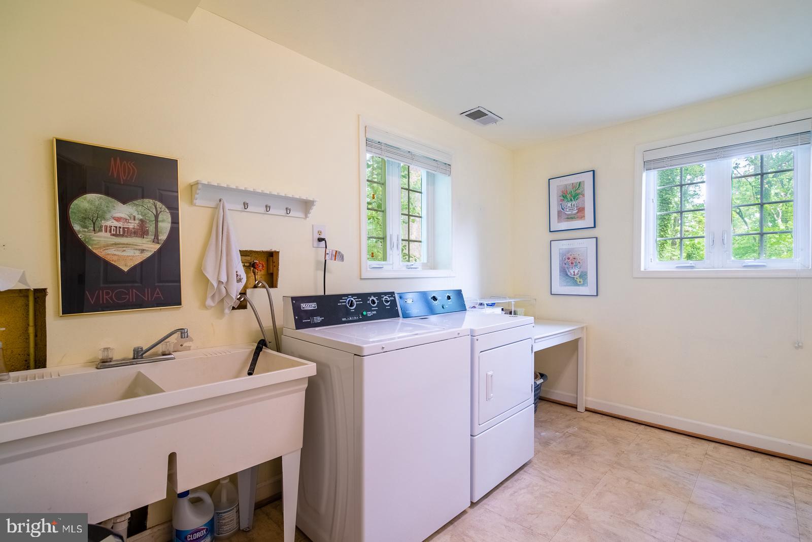 9112 Grist Mill Road Alexandria, VA 22309 - Photo 28 of 35 HUGE laundry room with sink and folding table