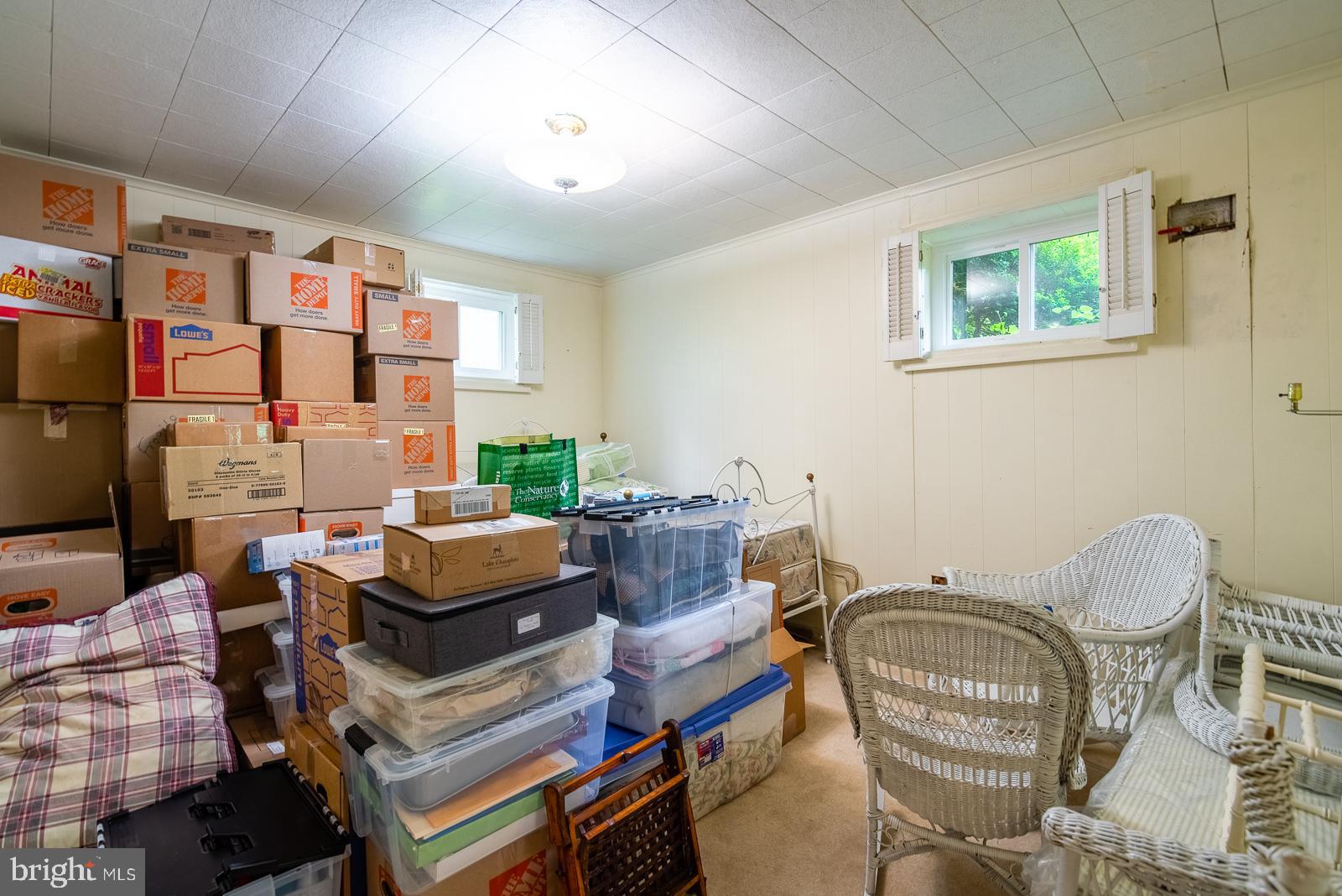 9112 Grist Mill Road Alexandria, VA 22309 - Photo 29 of 35 3rd bedrrom lower level- storing boxes until move