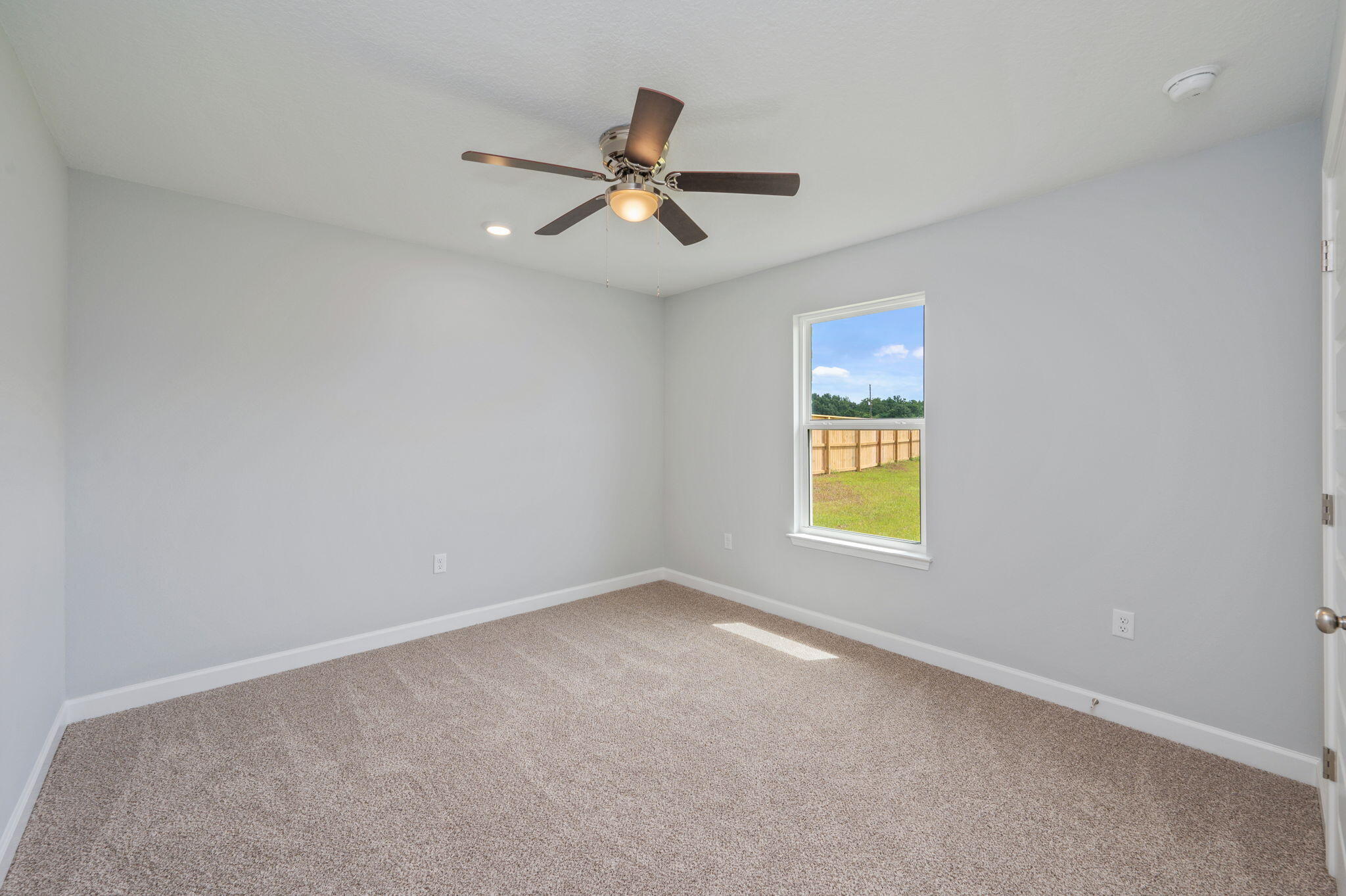 3851 Poverty Creek Road Crestview, FL 32539 - Photo 27 of 32 a view of an empty room with a window
