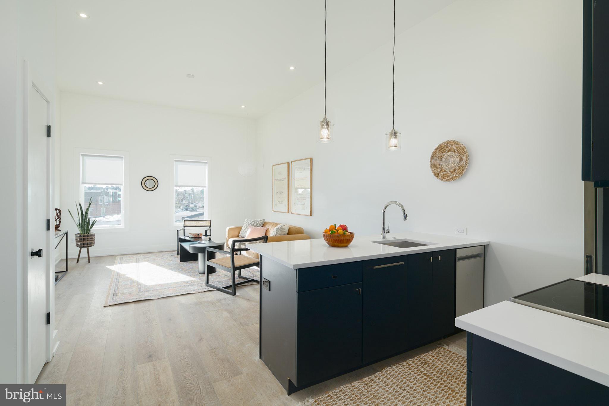 5013 Springfield Avenue, Unit 515 Philadelphia, PA 19143 - Photo 8 of 21 a living room with furniture