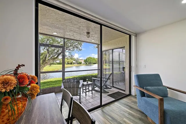 a living room filled with furniture and a table