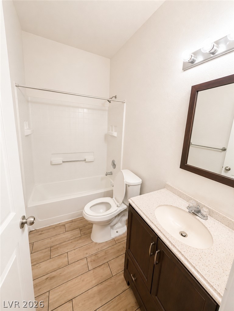4730 East Craig Road, Unit 1163 Las Vegas, NV 89115 - Photo 6 of 6 A well-appointed bath with sleek tile flooring and a functional vanity offers everyday convenience.