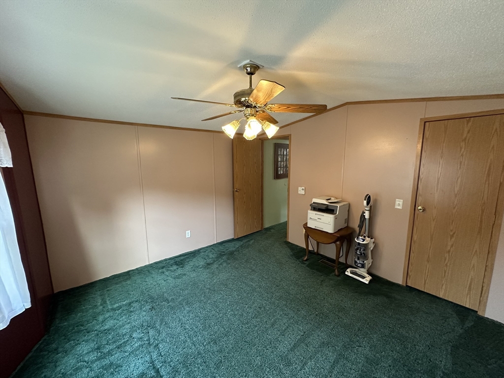 72 Quaboag Valley, Unit 70 Palmer, MA 01069 - Photo 16 of 21 a very nice looking room with a window