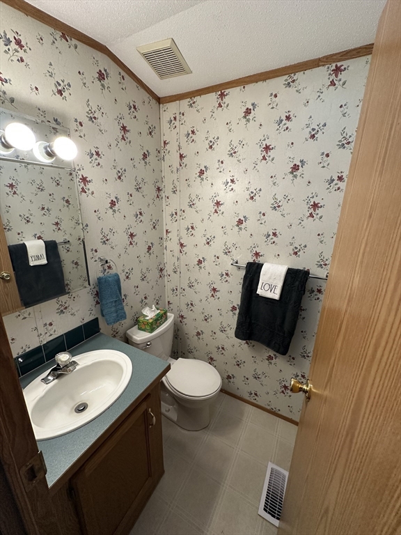 72 Quaboag Valley, Unit 70 Palmer, MA 01069 - Photo 20 of 21 a bathroom with a sink toilet and shower