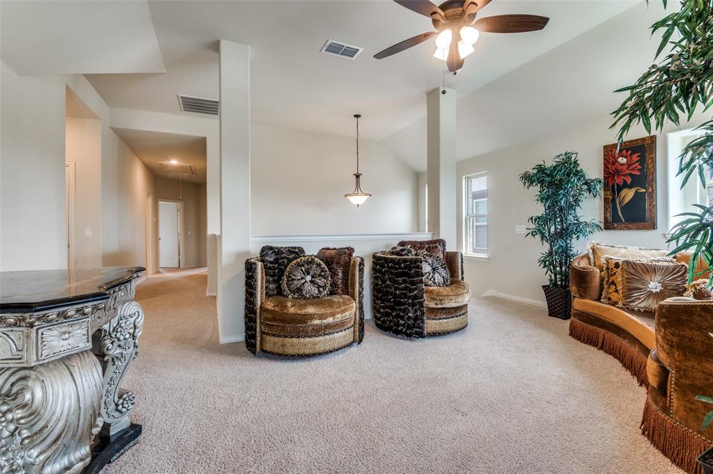 3822 Myrtle Way Kaufman, TX 75142 - Photo 24 of 39 a living room with furniture and a chandelier