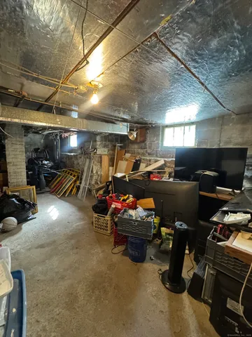 a view of a kitchen with a sink and cabinets