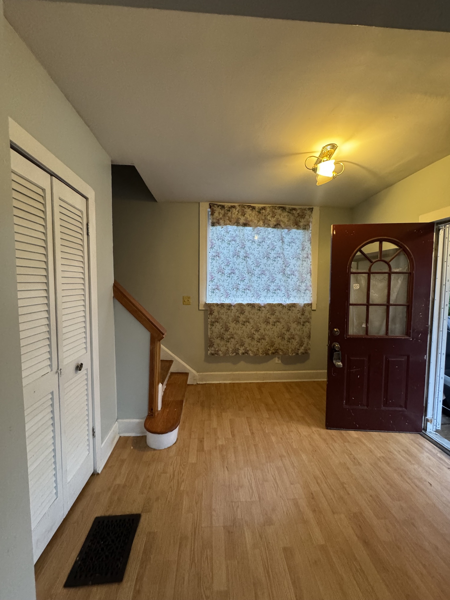731 George Street New Haven, CT 06511 - Photo 21 of 25 a view of empty room with a fireplace and wooden floor