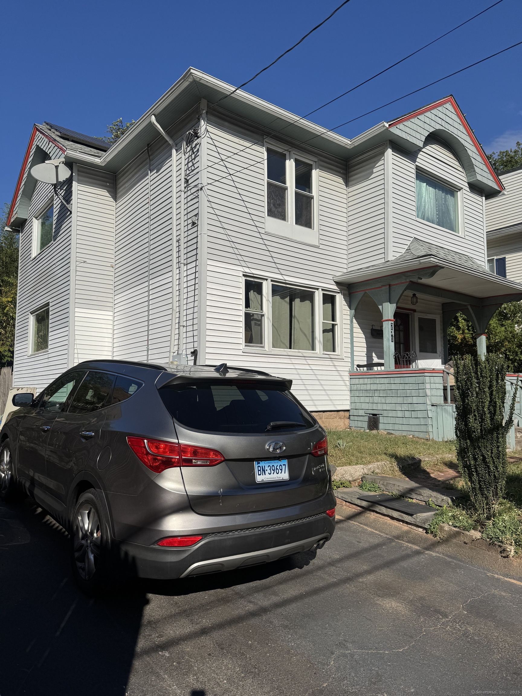 731 George Street New Haven, CT 06511 - Photo 24 of 25 a car parked in front of a house