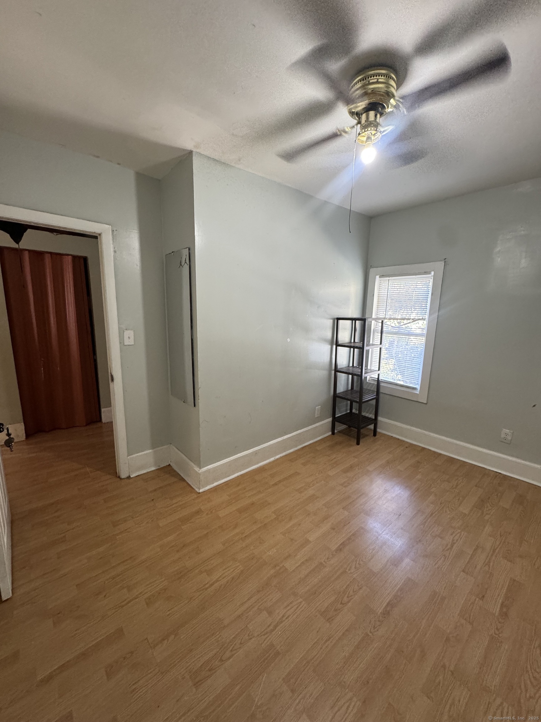 731 George Street New Haven, CT 06511 - Photo 6 of 25 a view of an empty room with a window