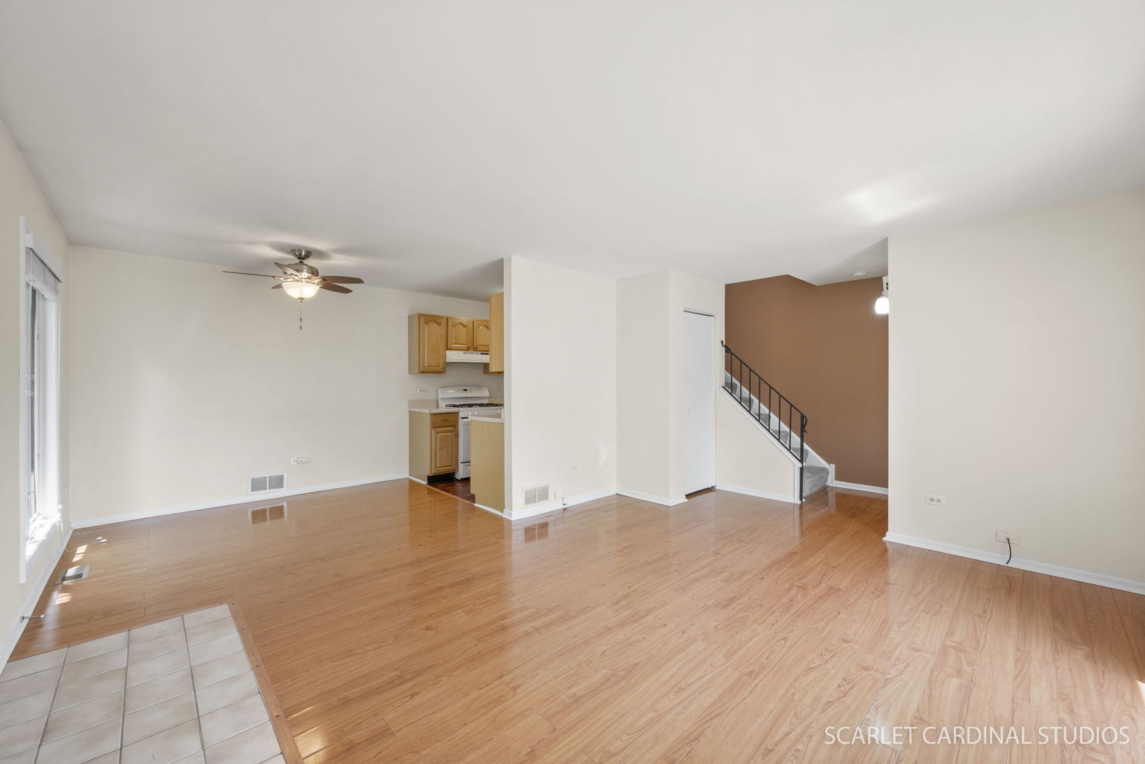 472 Sunnybrook Lane Wheaton, IL 60187 - Photo 2 of 11 wooden floor in an empty room with a window