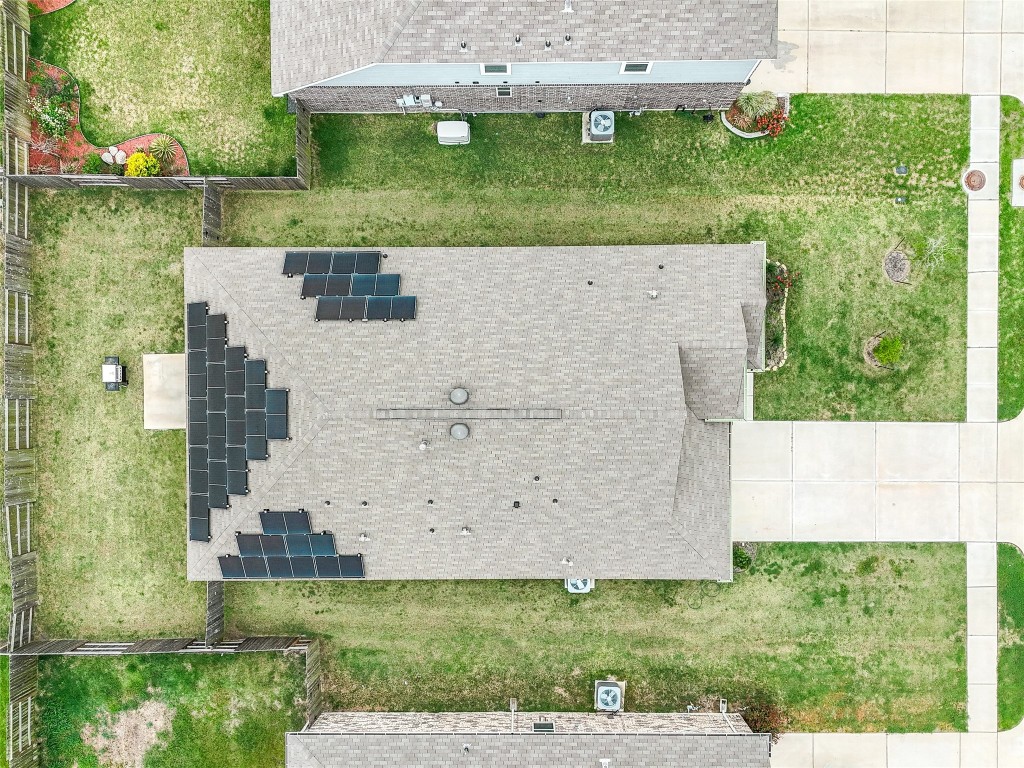 5912 Whitewing Road Rosenberg, TX 77469 - Photo 4 of 25 Aerial view showcasing a home equipped with efficient solar panels for sustainable living.