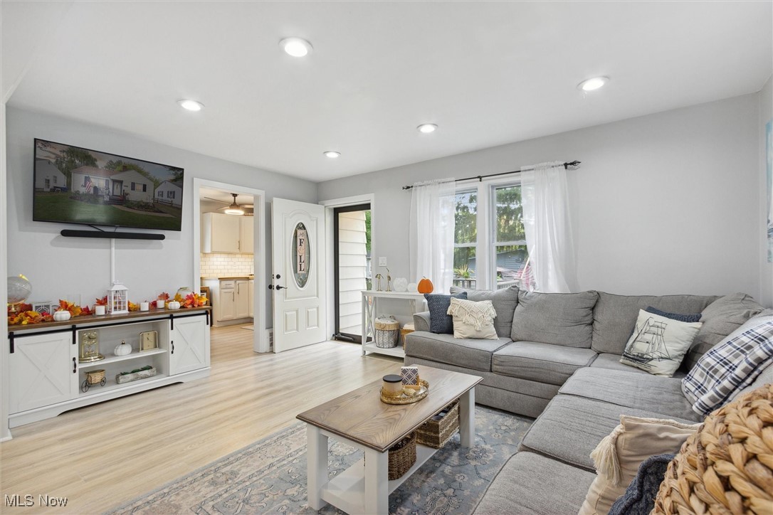 373 Erie Road Vermilion, OH 44089 - Photo 9 of 29 Living room featuring light wood-type flooring