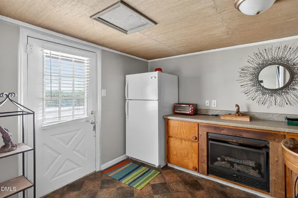 a livingroom with furniture and a window