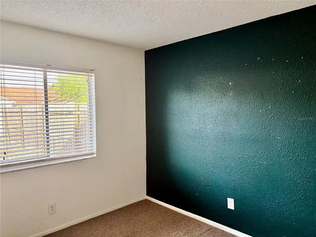 a view of empty room with window