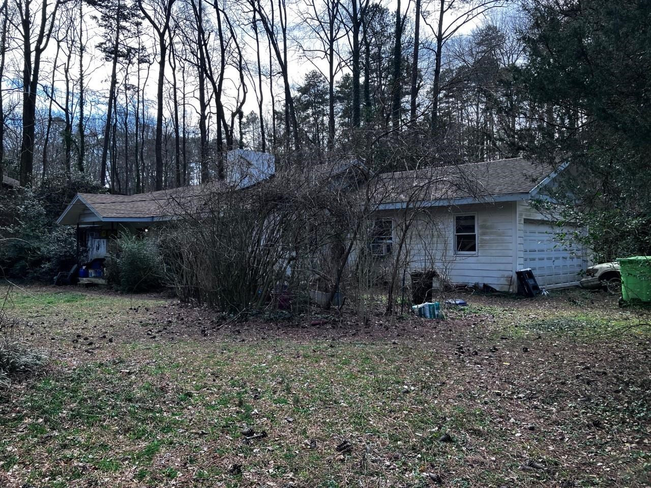 1212 Onslow Road Raleigh, NC 27606 - Photo 2 of 6 a view of a house with a yard and tree