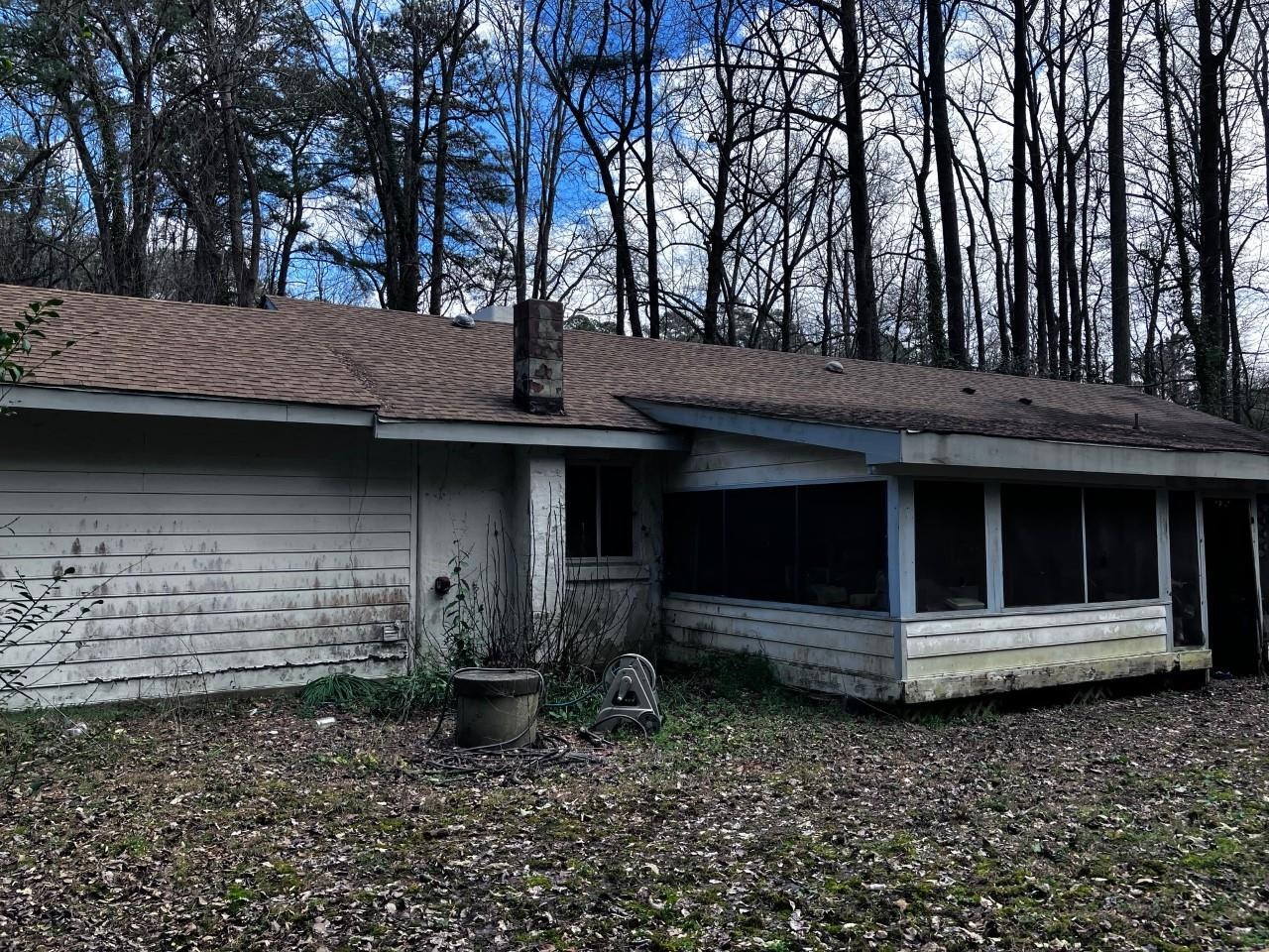 1212 Onslow Road Raleigh, NC 27606 - Photo 3 of 6 a view of a house with a yard