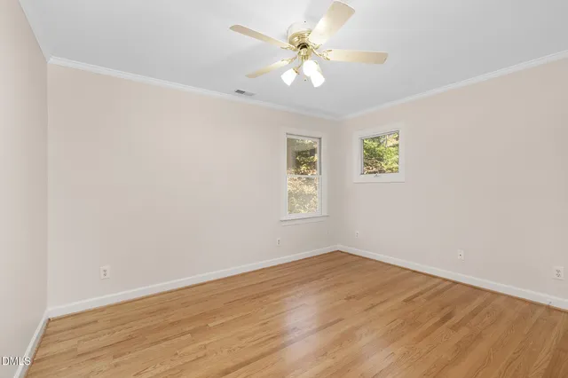 a bathroom with a granite countertop sink mirror toilet and bathtub