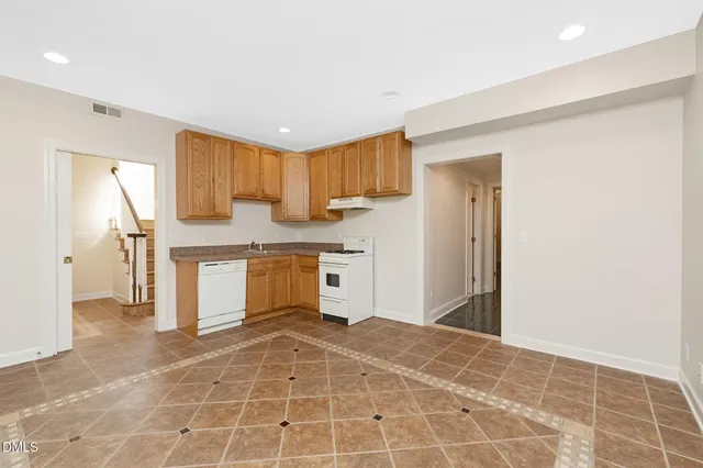 a living room with furniture or couch and a large window