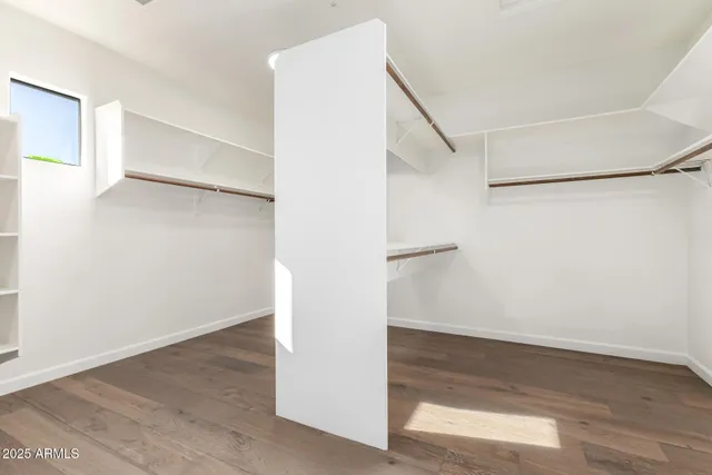 a view of a swimming pool with a lounge chairs