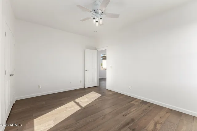 a view of a swimming pool with a yard