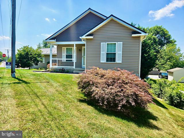 201 St Paul Street Boonsboro, MD 21713 - Photo 3 of 6 Charming home with lush greenery.