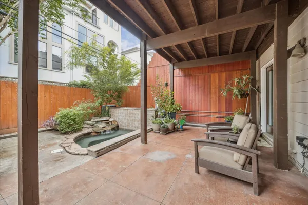 a view of a swimming pool and an outdoor space